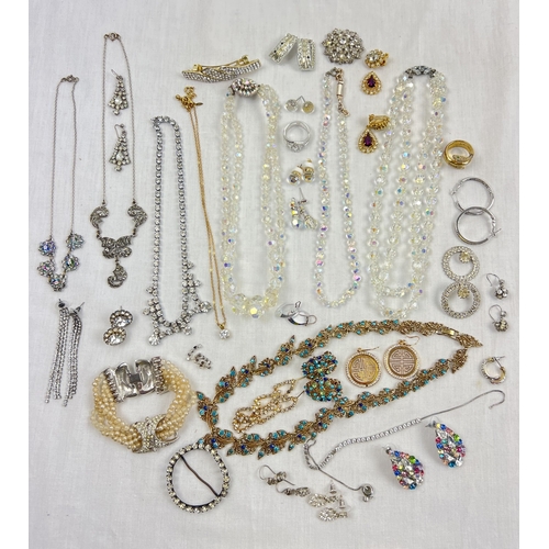 198 - A tray of vintage and modern diamante and stone set costume jewellery. To include necklaces, earring... 