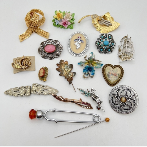 199 - A collection of 17 vintage brooches in various conditions, sizes and designs together with a pair of... 