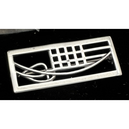 1004 - A boxed silver brooch of tulip and lattice design, from the Rennie Mackintosh Collection .  Silver m... 