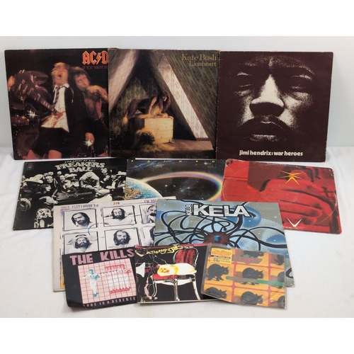 1297 - Collection of 11 modern and vintage vinyl records. To include: Jimi Hendrix, Kate Bush, ACDC, Shel S... 