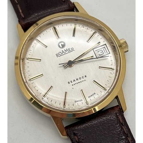 1119 - A vintage Roamer Searock automatic wristwatch with brown leather strap. Gold tone case with white fa... 