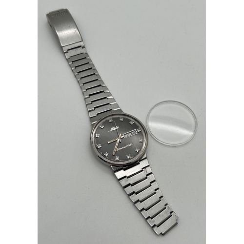 1121 - A vintage 1980's Ocean Star Datoday automatic wristwatch by Mido. Gunmetal grey face with stainless ... 