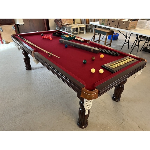 1352 - An 8ft x 4ft solid mahogany slate bed Pool/Snooker and Dining table. With Windsor red cloth and turn... 