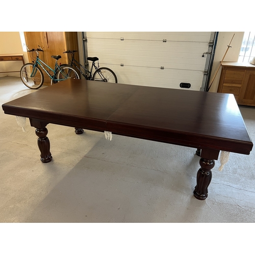 1352 - An 8ft x 4ft solid mahogany slate bed Pool/Snooker and Dining table. With Windsor red cloth and turn... 