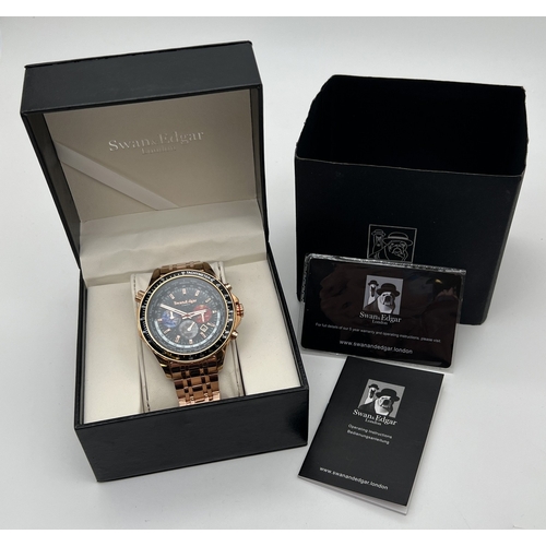 1122 - A boxed World Timer chronograph automatic wristwatch by Swan & Edgar, London. Rose gold tone stainle... 