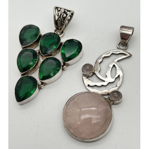 1022 - 2 modern design semi precious stone set pendants. A triangular shaped pendant set with 6 teardrop cu... 