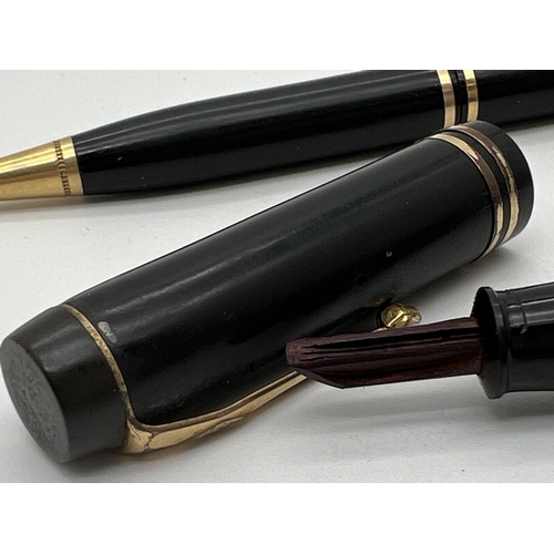 1201 - A vintage Conway Stewart, London No. 30 fountain pen without nib together with a No. 21 propelling p... 