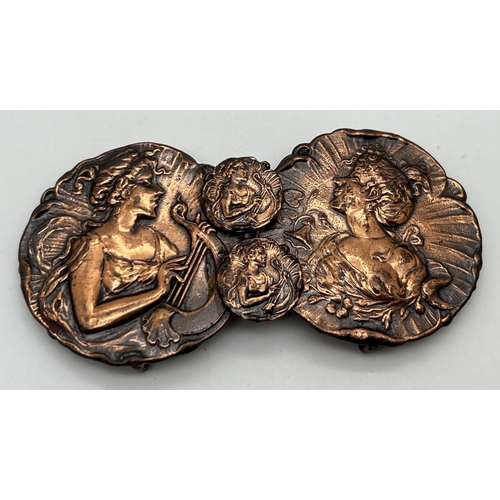 1205 - A decorative Art Nouveau style belt buckle with female figural detail. Made from copper salvaged fro... 