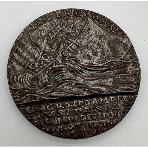 1227 - A WWI style cast metal medallion to commemorate the sinking of the Lusitania. Reverse depicts the si... 