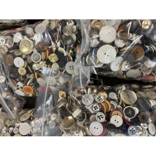 1306 - A large quantity, approx. 9.5kg, of assorted buttons in varying sizes, colours and designs. 9 x 1kg ... 