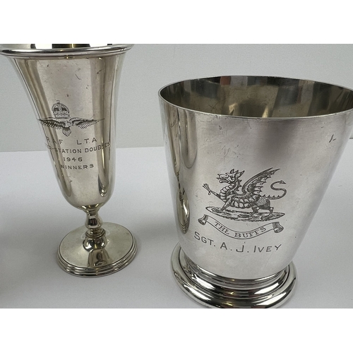 1229 - A collection of military related items. 2 military engraved silver plated presentation tankards and ... 