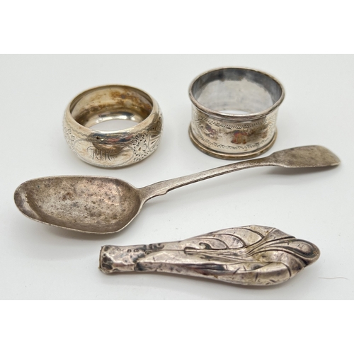 1155 - 4 silver items. 2 vintage silver napkin rings, both with floral decoration, together with a scrap si... 