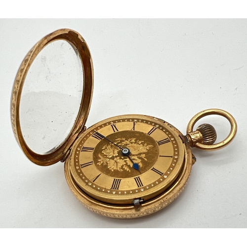 1128 - An Edwardian 18ct gold ladies pocket watch with ornate floral designed case. Empty cartouche to back... 