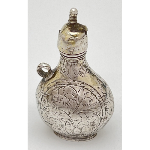 1156 - A late 17th Century silver scent flask of pilgrim form with engraved scene of Cupid to one side and ... 