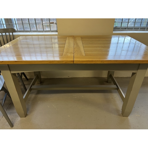 1357 - A modern pine dining table with natural wood finish top and grey painted base. Together with 7 grey ... 