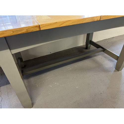 1357 - A modern pine dining table with natural wood finish top and grey painted base. Together with 7 grey ... 