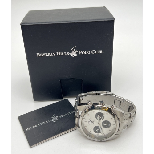 1134 - A boxed Beverley Hills Polo Club chronograph wristwatch. Stainless steel strap and case with pale si... 