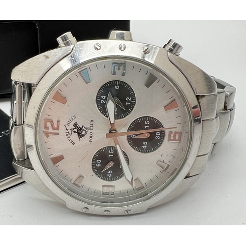 1134 - A boxed Beverley Hills Polo Club chronograph wristwatch. Stainless steel strap and case with pale si... 