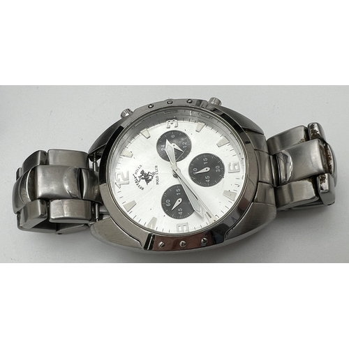 1134 - A boxed Beverley Hills Polo Club chronograph wristwatch. Stainless steel strap and case with pale si... 