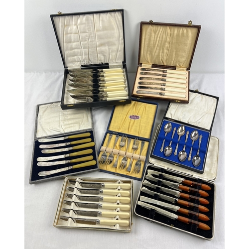 1207 - A collection of boxed vintage cutlery sets to include a set of Art Deco Southern & Richardson knives... 