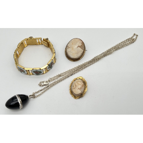 1069 - 4 items of costume jewellery. An enamel panelled bracelet with classic scenes of a courting couple, ... 