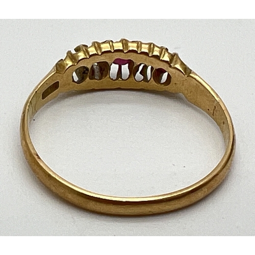 1081 - A vintage 18ct gold, ruby and diamond ring with pierced work mount (1 ruby missing). Fully hallmarke... 