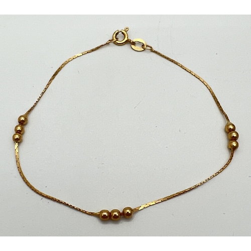 1084 - A 9ct gold 7