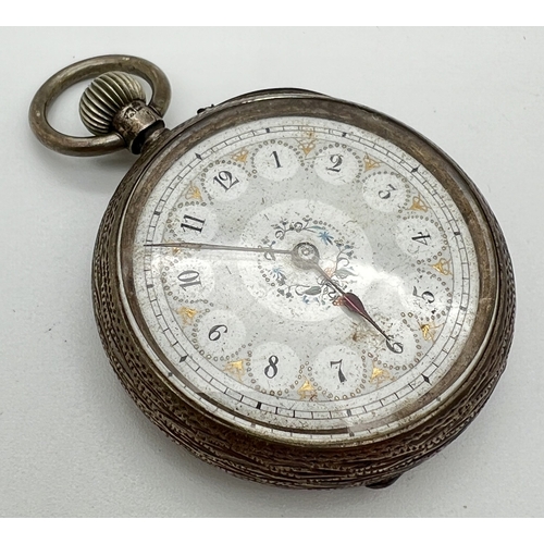 1142 - A Victorian silver ladies pocket watch with engraved design to case and floral detail to face. Hallm... 