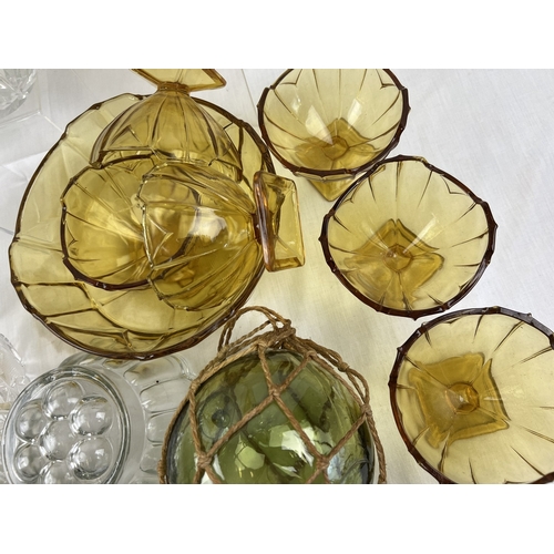 1261 - A collection of assorted vintage coloured & clear glass ware to include large crystal vase and fruit... 