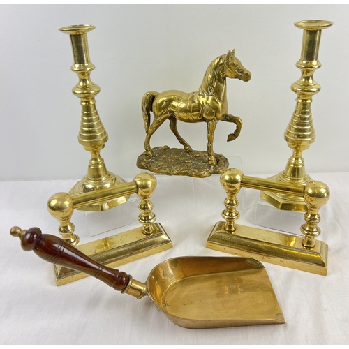 1212 - A collection of assorted vintage heavy brass items to include a large pair of candlesticks, a pair o... 