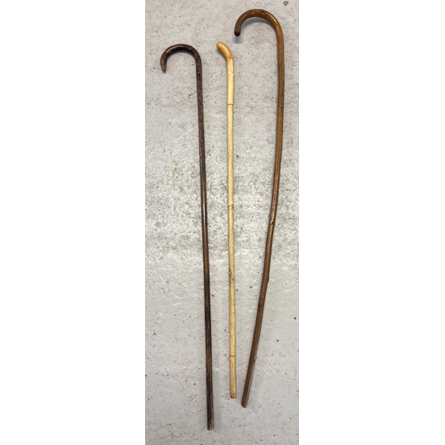 1326 - 3 antique walking canes or stockman's sticks, 2 curve handled. Longest approx. 85cm long.