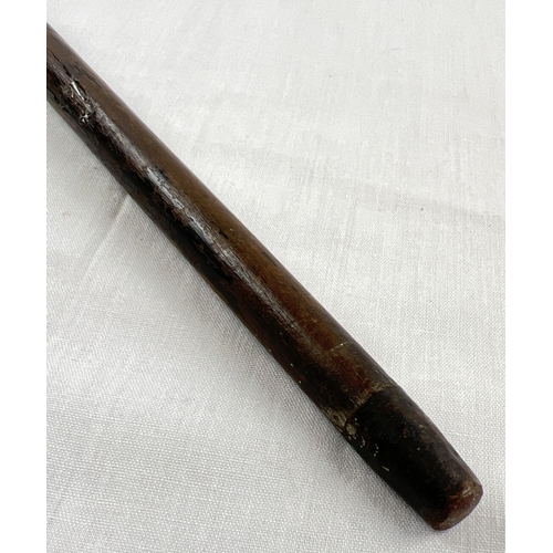 1172 - An antique ebonised walking cane with hallmarked silver pommel top. Assay mark for London, date lett... 