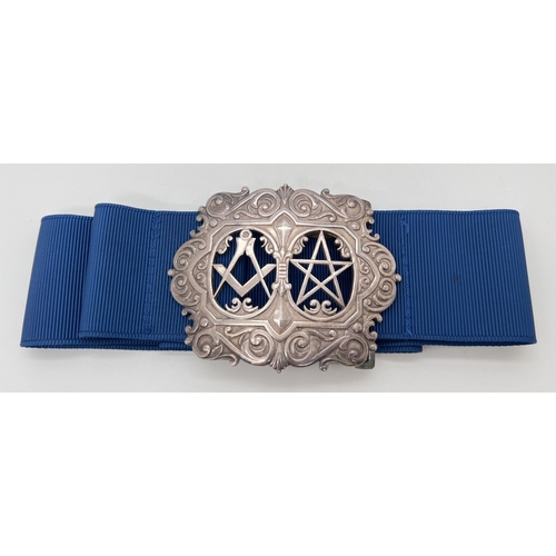 1173 - A vintage Elizabeth II silver Masonic nurses buckle on blue fabric belt. Fully hallmarked to reverse... 