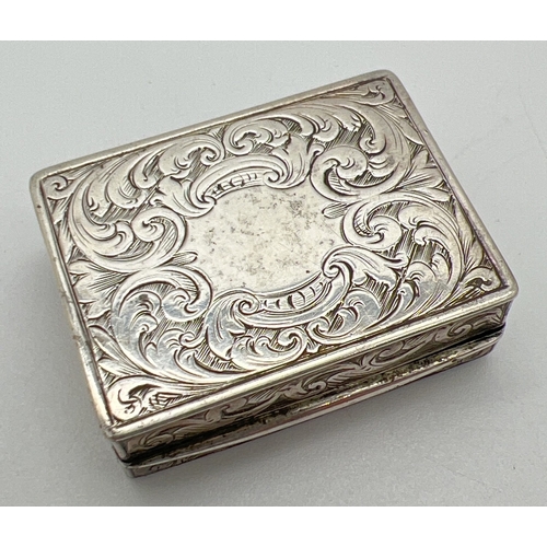 1177 - A Victorian silver snuff box with engraved scroll & foliate design, lid set with bloodstone panels. ... 