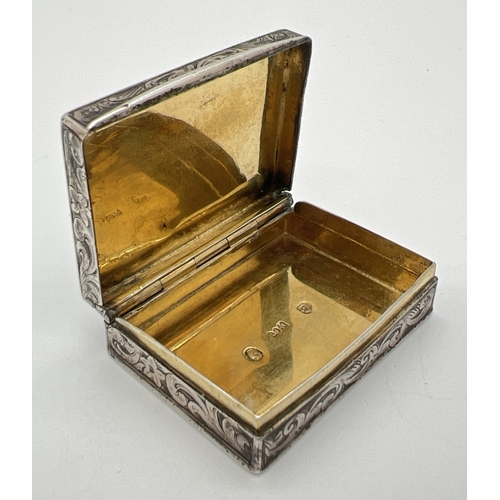 1177 - A Victorian silver snuff box with engraved scroll & foliate design, lid set with bloodstone panels. ... 