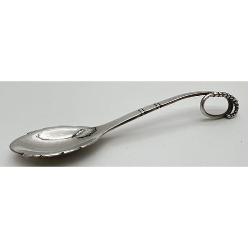 1182 - A mid century Georg Jensen silver spoon, model No. 41, with leaf design bowl and beaded accent to lo... 