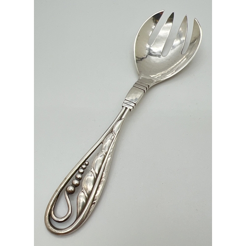 1183 - A vintage Georg Jensen silver 4 prong salad fork, model No. 42, with foliate design pierced handle. ... 