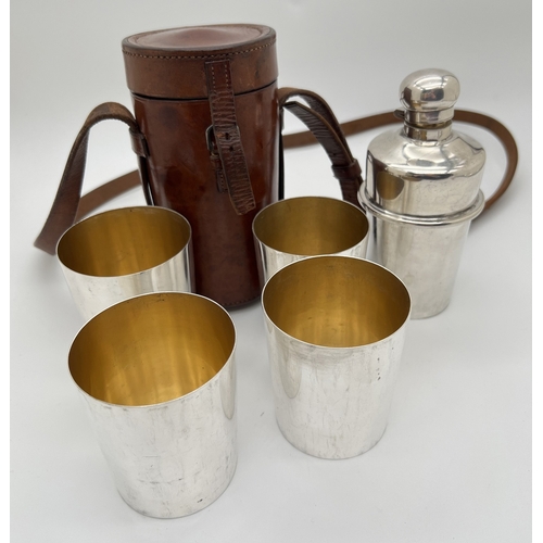 1187 - An early 20th century Walker & Hall silver plated hunting flask with 4 graduating stackable beakers,... 