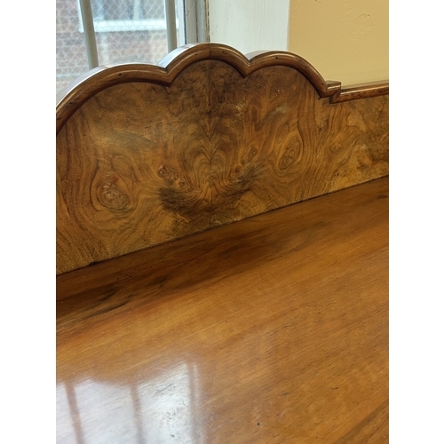 1359 - An antique walnut Queen Anne style sideboard raised on cabriole legs with carved detail. 2 central b... 