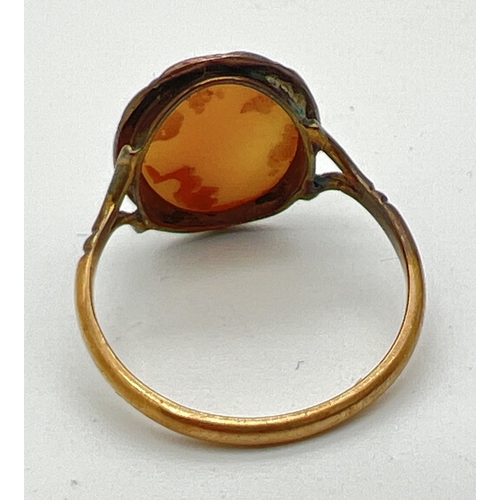 90 - A vintage 9ct gold cameo ring with beaded decoration to mount. Gold mark inside band. Ring size P. T... 