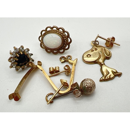 187 - A small collection of scrap gold and stone set single earrings to include a sapphire set and opal se... 