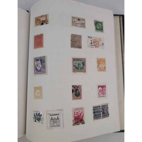 1268 - 2 vintage stamp stock books containing a collection of stamps from around the world. Blue album cont... 