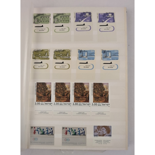 1268 - 2 vintage stamp stock books containing a collection of stamps from around the world. Blue album cont... 