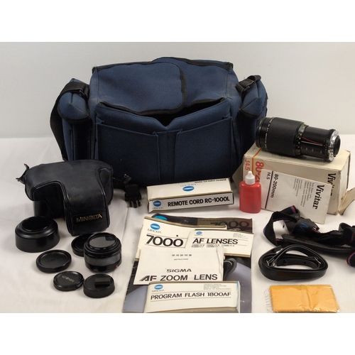 1280 - A Minolta 7000 protective case and collection of lens and accessories. To include: a boxed Vivitar F... 