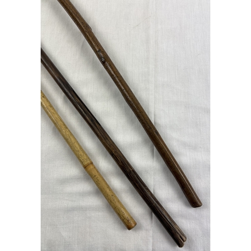 1326 - 3 antique walking canes or stockman's sticks, 2 curve handled. Longest approx. 85cm long.