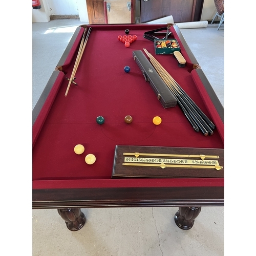 1352 - An 8ft x 4ft solid mahogany slate bed Pool/Snooker and Dining table. With Windsor red cloth and turn... 