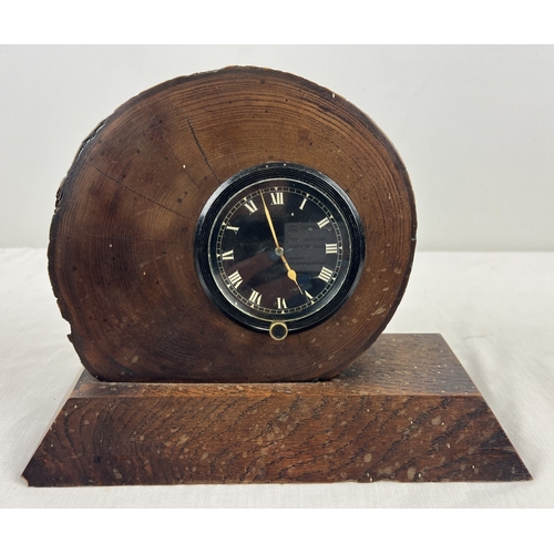 1256 - A vintage bespoke made wooden mantle clock. Made from a slice of tree trunk with a car clock insert ... 