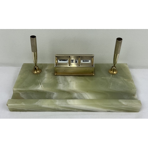 1342 - An Art Deco green onyx desk/pen stand with perpetual calendar and pen rests in gold tone finish. App... 