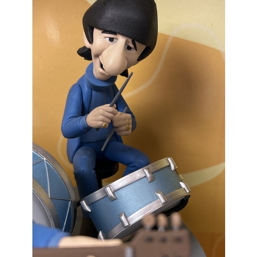 A Deluxe Boxed Set The Beatles by McFarlane Toys. Characters are
