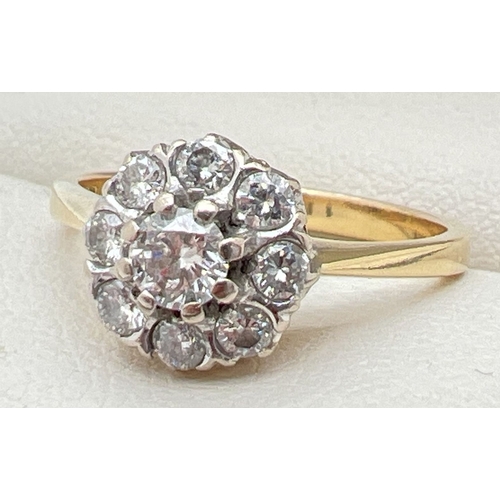 1020 - A vintage 18ct yellow gold diamond cluster ring. Central 0.10ct diamond surrounded by 8 smaller roun... 